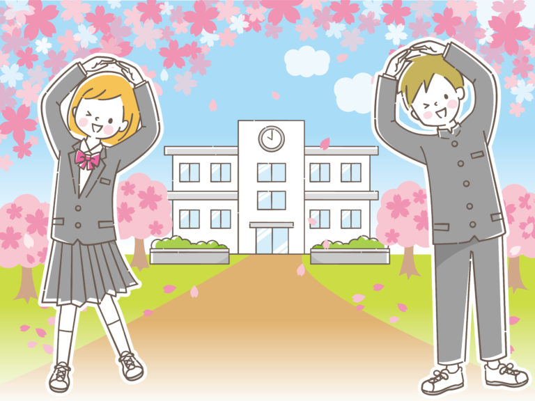 学校前で頭上で丸を作る男女生徒